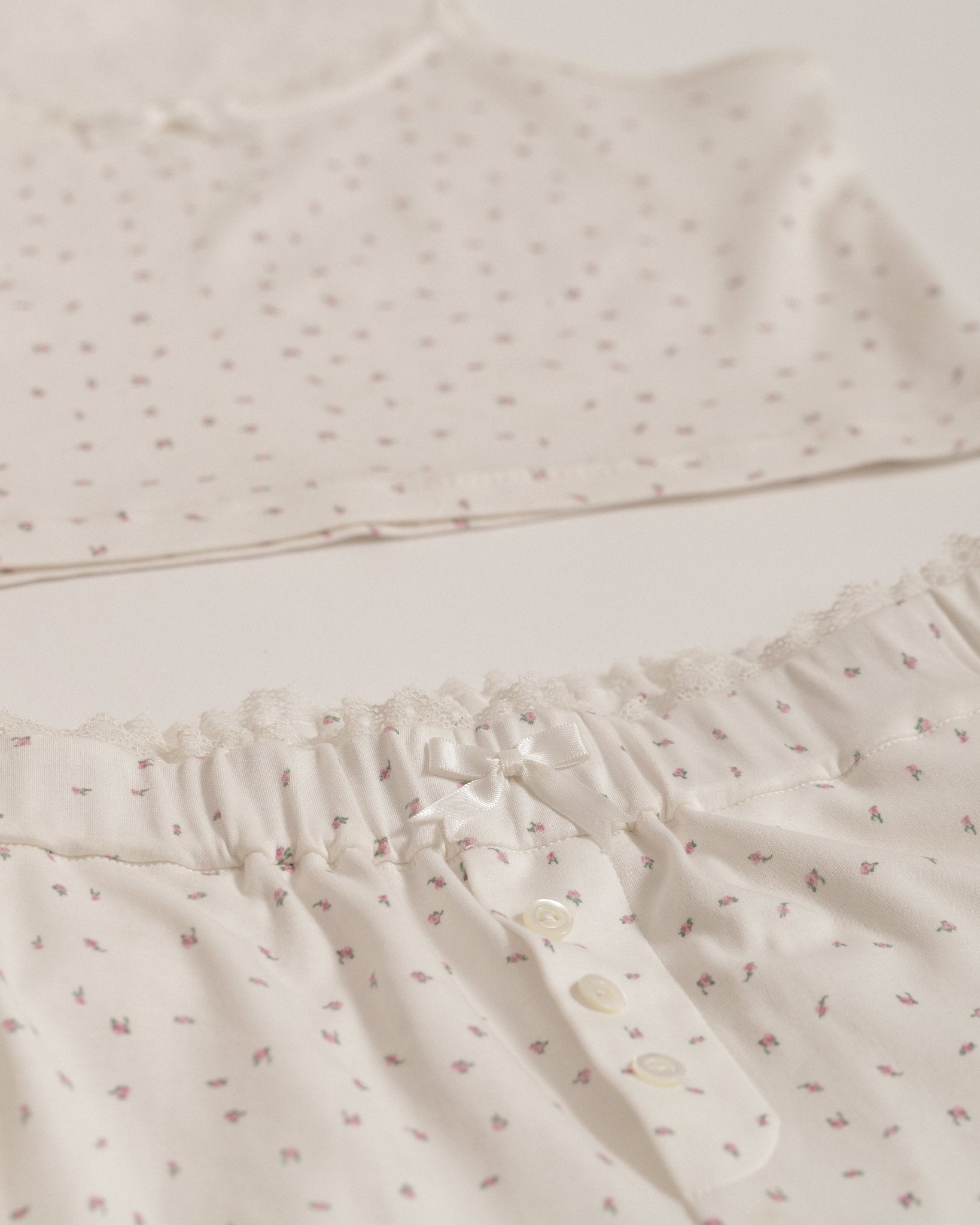 Isla Lune premium women’s cotton pajama set — breathable sleepwear for ritual and nighttime recovery, shown on two women in soft natural light.