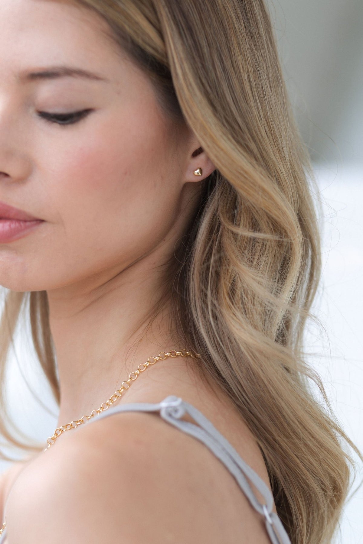 Close view of the thin adjustable strap on The Moonmilk cotton pajama top in Stone